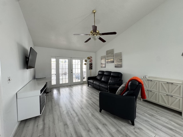 1518 Royal Forest Ct, Palm Springs, FL 33406 - living room with vaulted ceiling, light wood-type flooring, french doors, and a ceiling fan