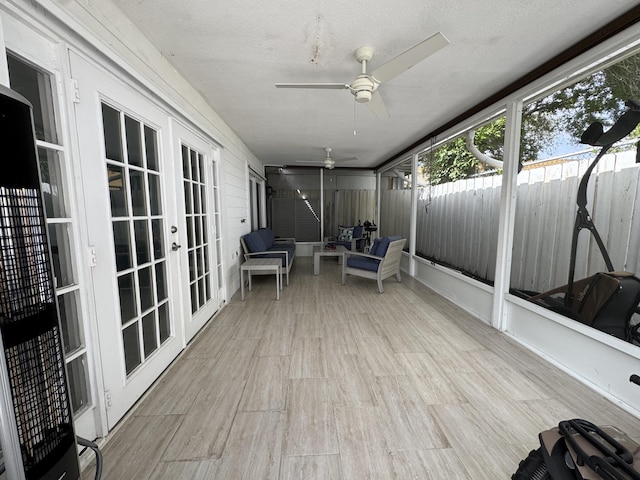 1518 Royal Forest Ct, Palm Springs, FL 33406 - sunroom featuring french doors, ceiling fan, and outdoor lounge area