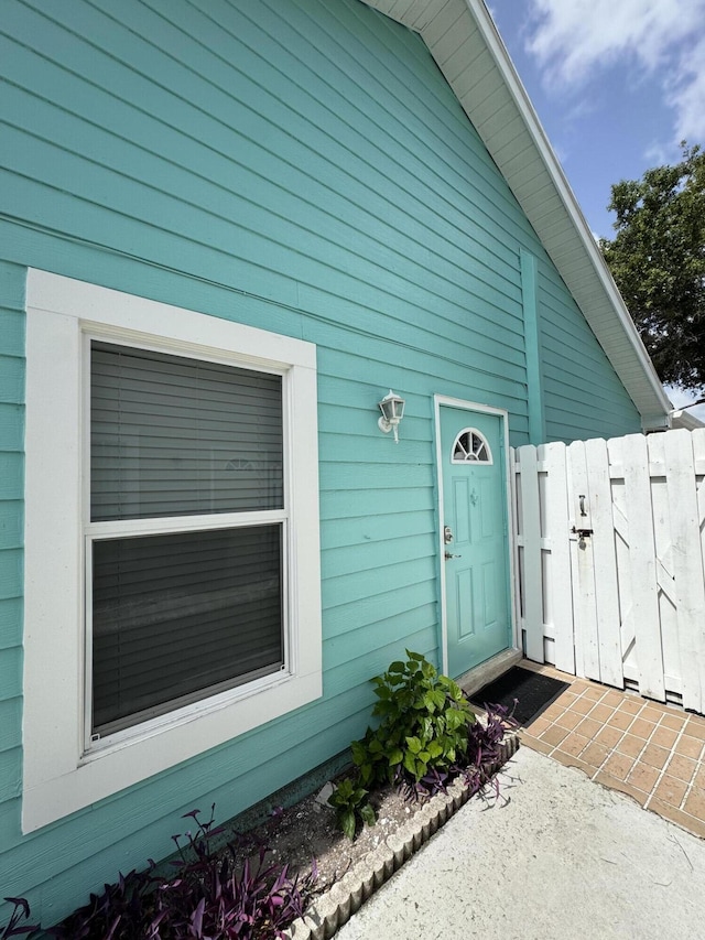 1518 Royal Forest Ct, Palm Springs, FL 33406 - doorway to property with a gate