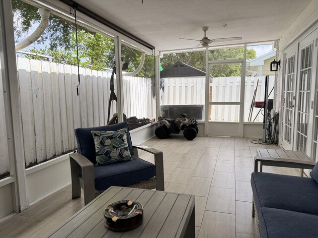 1518 Royal Forest Ct, Palm Springs, FL 33406 - sunroom featuring french doors, ceiling fan, and plenty of natural light