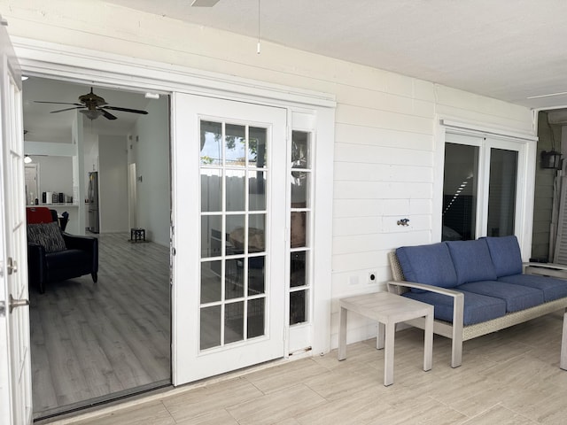 1518 Royal Forest Ct, Palm Springs, FL 33406 - wooden terrace with ceiling fan and an outdoor hangout area