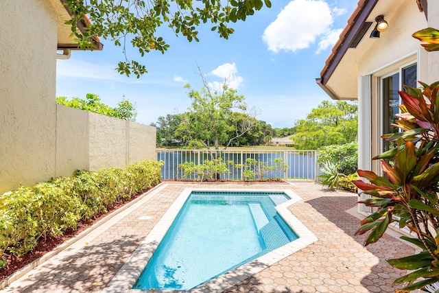 23193 Via Stel, Boca Raton, FL 33433 - view of swimming pool with a fenced backyard and a patio area