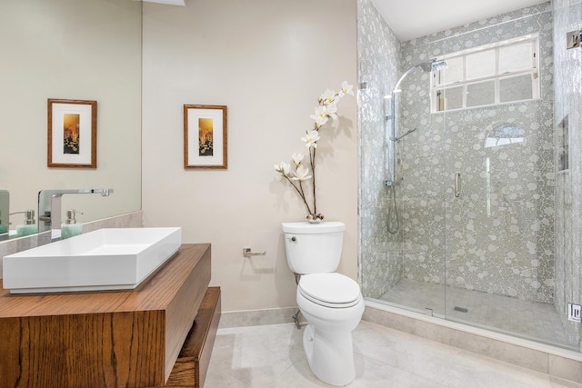 23193 Via Stel, Boca Raton, FL 33433 - bathroom with toilet, a shower stall, vanity, tile patterned flooring, and baseboards
