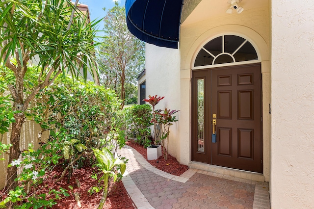 23193 Via Stel, Boca Raton, FL 33433 - property entrance with stucco siding