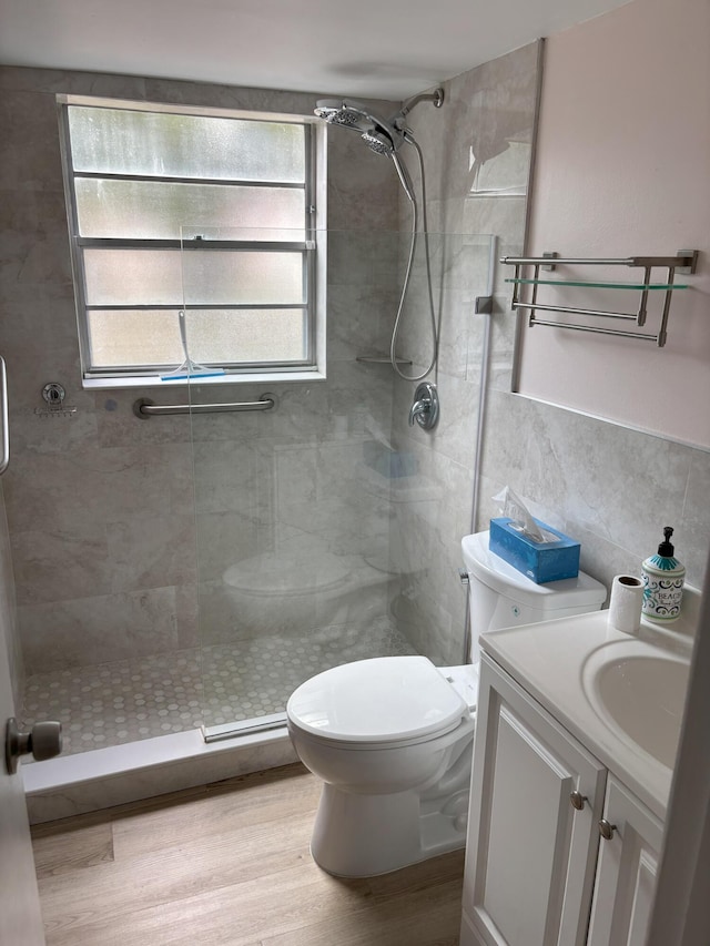 216 Dorchester J, West Palm Beach, FL 33417 - bathroom featuring toilet, a stall shower, and vanity