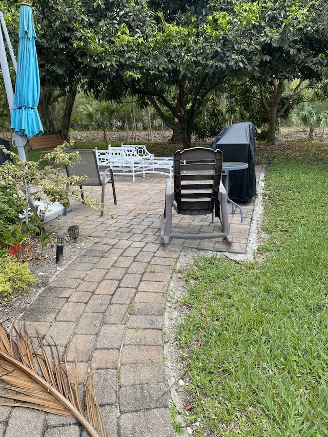 216 Dorchester J, West Palm Beach, FL 33417 - view of patio with area for grilling
