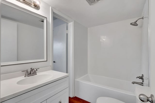 2936 Lake Shore Dr Unit 108, Riviera Beach, FL 33404 - bathroom featuring vanity, shower / bath combination, and wood finished floors