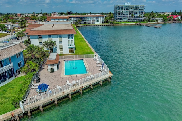 2936 Lake Shore Dr Unit 108, Riviera Beach, FL 33404 - drone / aerial view of a nearby body of water and a pool area