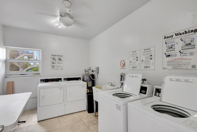 2936 Lake Shore Dr Unit 108, Riviera Beach, FL 33404 - shared laundry room featuring separate washer and dryer, a ceiling fan, and light stone finish floors