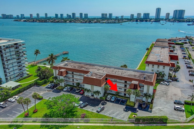 2936 Lake Shore Dr Unit 108, Riviera Beach, FL 33404 - drone / aerial view of skyline and a nearby body of water