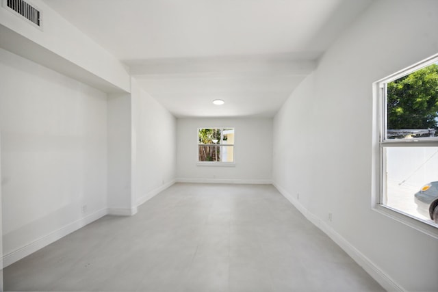811 Hunter St, West Palm Beach, FL 33405 - spare room featuring healthy amount of natural light and baseboards
