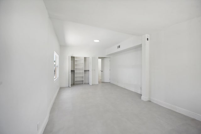 811 Hunter St, West Palm Beach, FL 33405 - unfurnished bedroom featuring baseboards, recessed lighting, and concrete floors