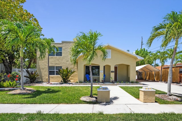 811 Hunter St, West Palm Beach, FL 33405 - view of front of home with stucco siding