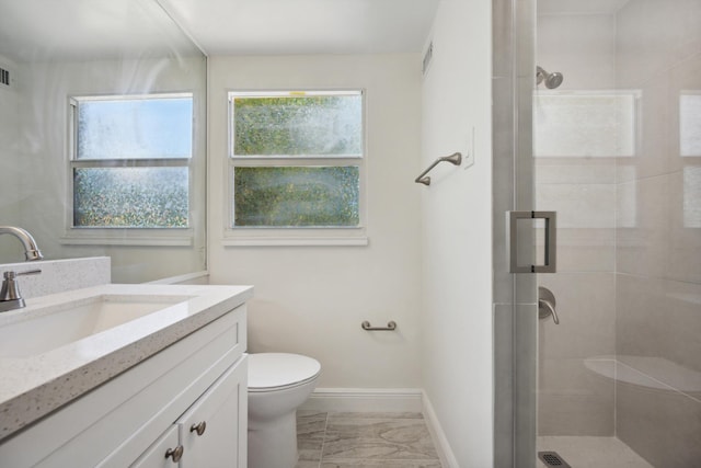 811 Hunter St, West Palm Beach, FL 33405 - full bathroom with toilet, vanity, a stall shower, and baseboards