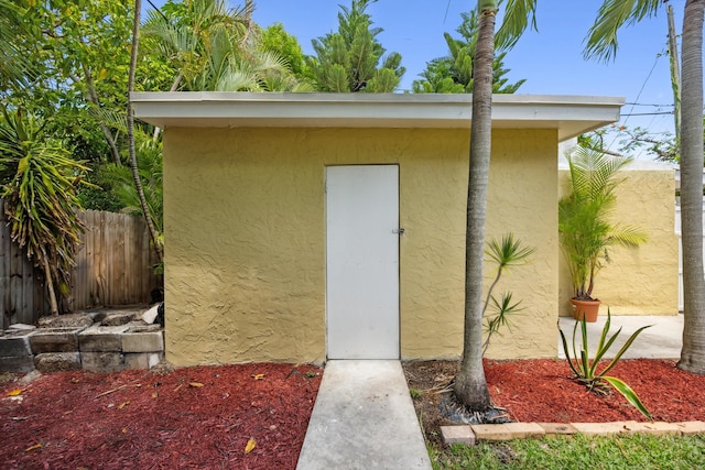 811 Hunter St, West Palm Beach, FL 33405 - view of exterior entry featuring stucco siding
