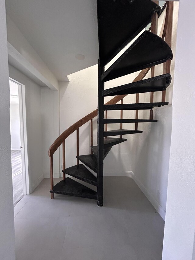 811 Hunter St, West Palm Beach, FL 33405 - staircase with baseboards