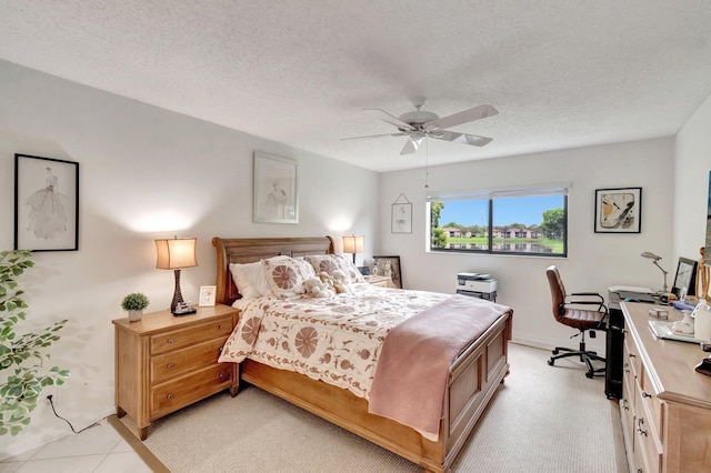 15075 Witney Rd Unit 212, Delray Beach, FL 33484 - bedroom with a desk, a ceiling fan, and a textured ceiling