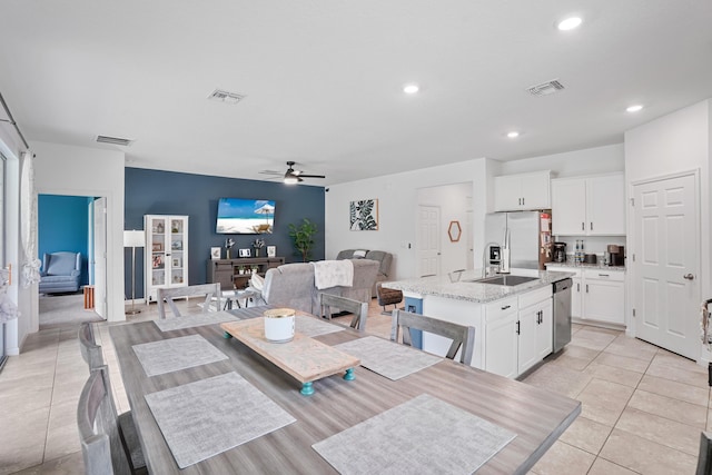 2431 Crowned Eagle Cir SW, Vero Beach, FL 32962 - dining space featuring ceiling fan, light tile patterned flooring, and recessed lighting