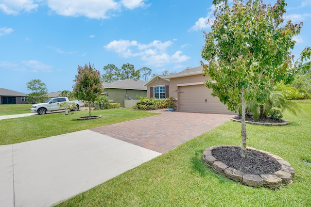 2431 Crowned Eagle Cir SW, Vero Beach, FL 32962 - view of front of house featuring stucco siding, decorative driveway, an attached garage, and a front lawn