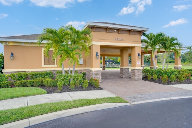 2431 Crowned Eagle Cir SW, Vero Beach, FL 32962 - view of building exterior featuring decorative driveway
