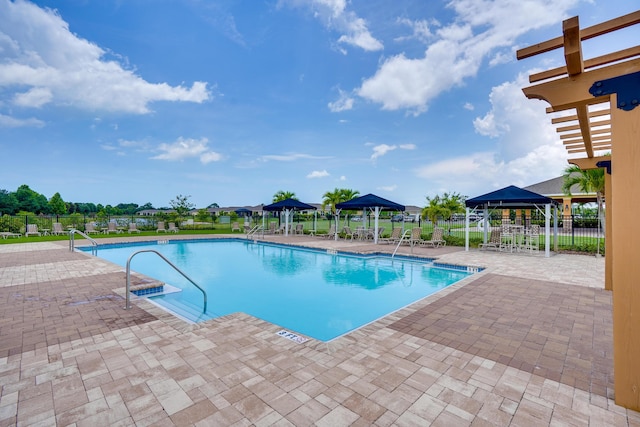 2431 Crowned Eagle Cir SW, Vero Beach, FL 32962 - community pool featuring a gazebo and a patio