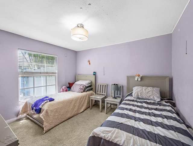 505 Palmetto St, West Palm Beach, FL 33405 - carpeted bedroom featuring a textured ceiling