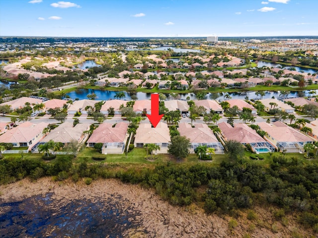 10834 SW Dardanelle Dr, Port Saint Lucie, FL 34987 - aerial overview of property's location featuring nearby suburban area and a nearby body of water