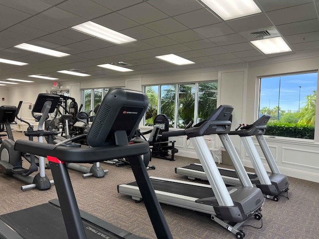 10834 SW Dardanelle Dr, Port Saint Lucie, FL 34987 - exercise room with carpet and a paneled ceiling