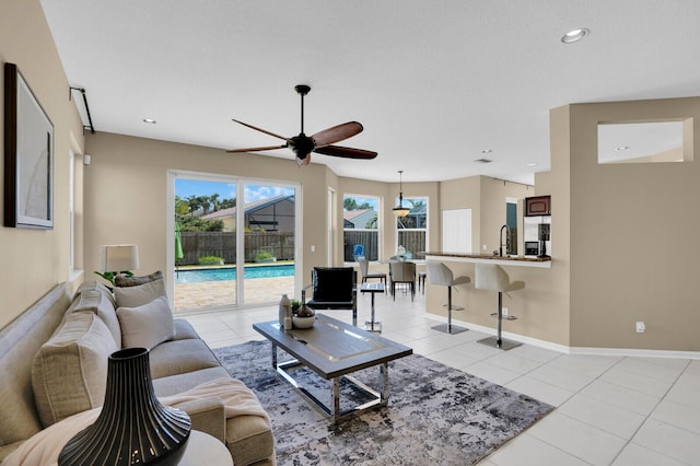 3559 Hudson Ln, Boynton Beach, FL 33436 - living area with a ceiling fan, light tile patterned flooring, and recessed lighting