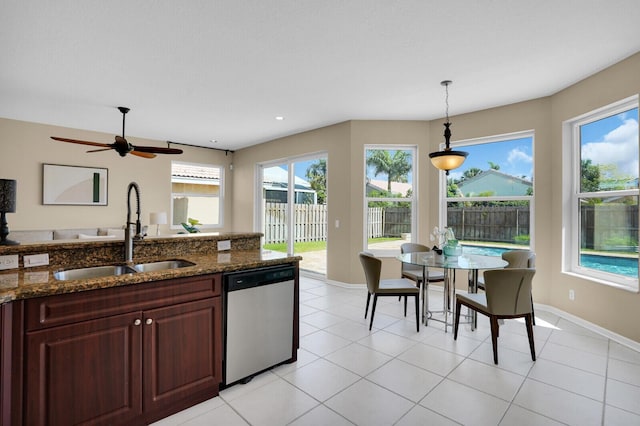 3559 Hudson Ln, Boynton Beach, FL 33436 - kitchen featuring stainless steel dishwasher, decorative light fixtures, dark stone countertops, ceiling fan, and recessed lighting