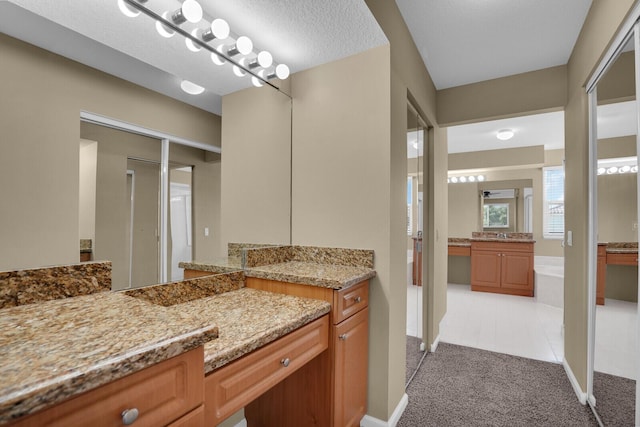 3559 Hudson Ln, Boynton Beach, FL 33436 - bathroom featuring vanity, a bath, and tile patterned flooring