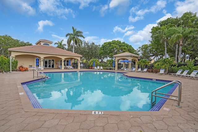 3559 Hudson Ln, Boynton Beach, FL 33436 - community pool with a patio area