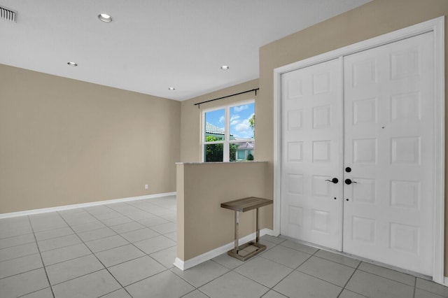 3559 Hudson Ln, Boynton Beach, FL 33436 - foyer entrance featuring light tile patterned floors and recessed lighting