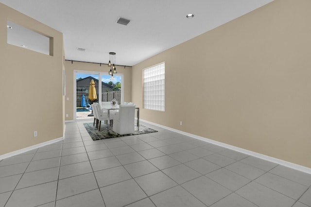 3559 Hudson Ln, Boynton Beach, FL 33436 - unfurnished dining area featuring light tile patterned floors and recessed lighting