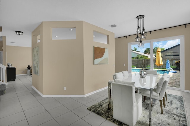 3559 Hudson Ln, Boynton Beach, FL 33436 - tiled dining area featuring baseboards
