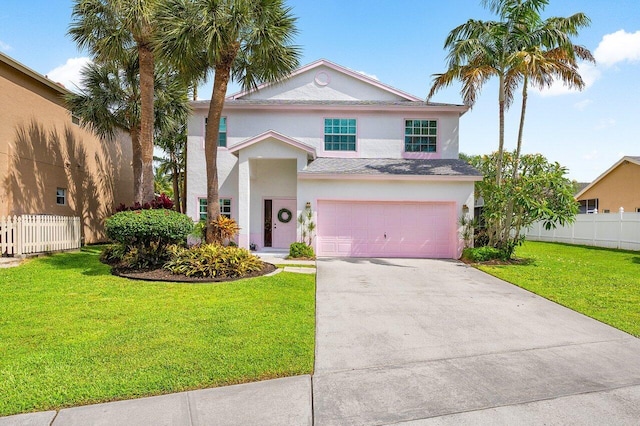 6321 Lansdowne Cir, Boynton Beach, FL 33472 - view of front facade with stucco siding, driveway, an attached garage, and a shingled roof