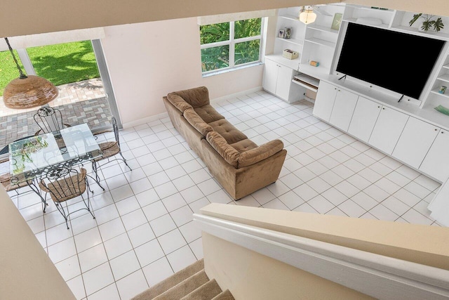 6321 Lansdowne Cir, Boynton Beach, FL 33472 - living room with light tile patterned floors and baseboards