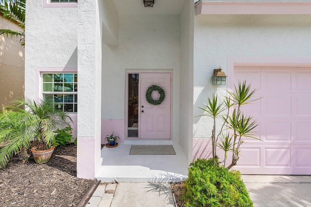 6321 Lansdowne Cir, Boynton Beach, FL 33472 - doorway to property with stucco siding