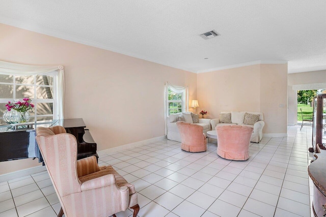 6321 Lansdowne Cir, Boynton Beach, FL 33472 - living area with crown molding, light tile patterned floors, a textured ceiling, and baseboards