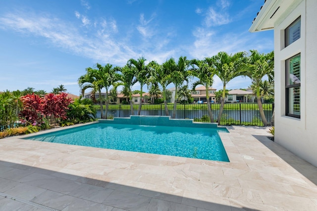 9350 Eden Roc Ct, Delray Beach, FL 33446 - view of swimming pool featuring a patio area, a water view, and a residential view