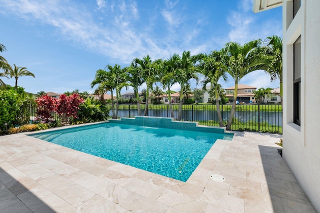 9350 Eden Roc Ct, Delray Beach, FL 33446 - view of swimming pool with a water view, a patio, and a fenced backyard