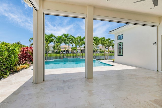 9350 Eden Roc Ct, Delray Beach, FL 33446 - view of pool featuring ceiling fan, a fenced backyard, and a patio