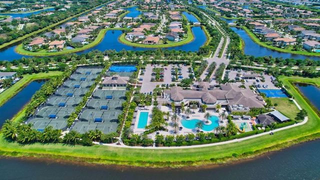 9350 Eden Roc Ct, Delray Beach, FL 33446 - aerial view of property and surrounding area featuring nearby suburban area, a large body of water, and a pool area