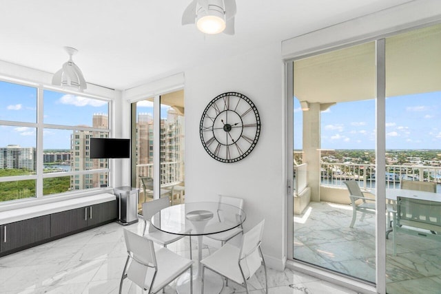 3700 S Ocean Blvd Unit 1210, Highland Beach, FL 33487 - sunroom / solarium featuring radiator heating unit and healthy amount of natural light