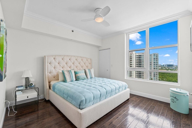 3700 S Ocean Blvd Unit 1210, Highland Beach, FL 33487 - bedroom with wood finished floors, baseboards, crown molding, a city view, and ceiling fan