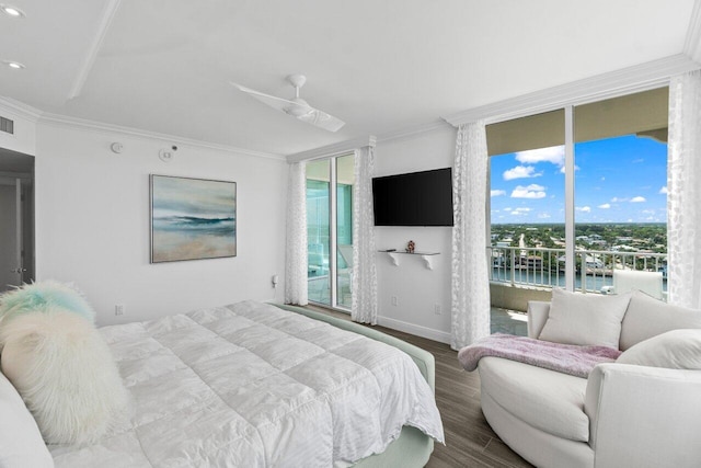 3700 S Ocean Blvd Unit 1210, Highland Beach, FL 33487 - bedroom featuring access to exterior, wood finished floors, multiple windows, crown molding, and baseboards