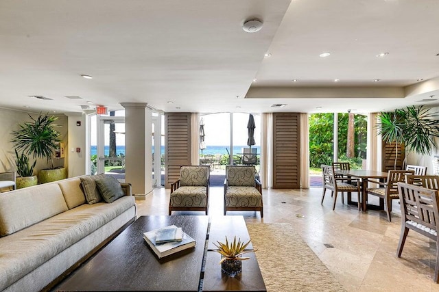 3700 S Ocean Blvd Unit 1210, Highland Beach, FL 33487 - living area with a wall of windows, healthy amount of natural light, and recessed lighting