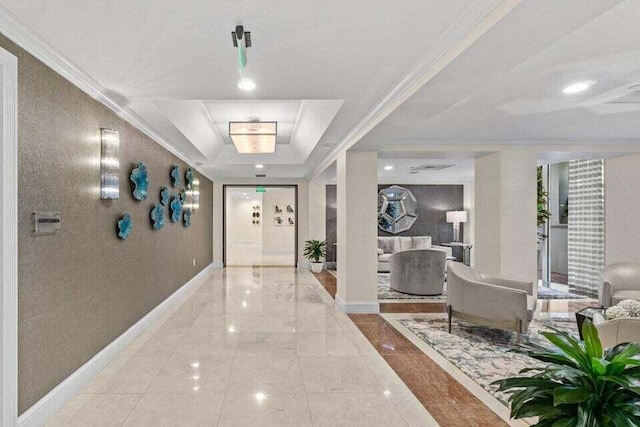 3700 S Ocean Blvd Unit 1210, Highland Beach, FL 33487 - corridor with baseboards and a tray ceiling