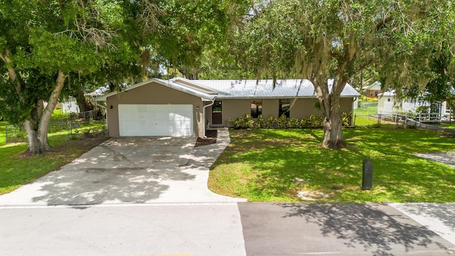 1793 SW 22nd Ter, Okeechobee, FL 34974 - ranch-style home featuring a garage, stucco siding, and concrete driveway