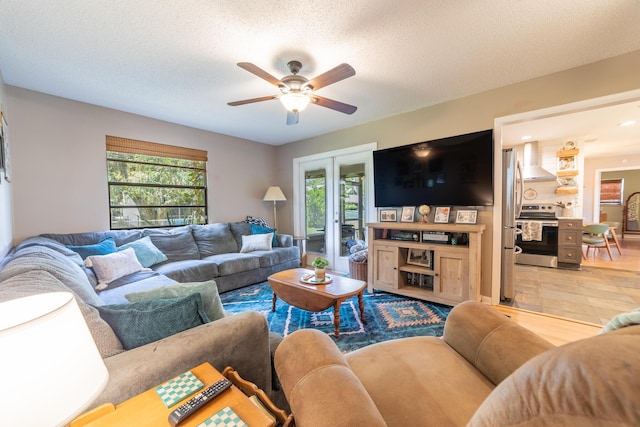 1793 SW 22nd Ter, Okeechobee, FL 34974 - living area featuring ceiling fan, healthy amount of natural light, and a textured ceiling